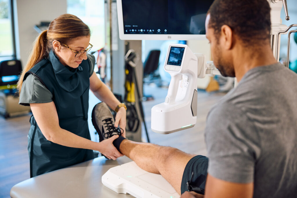knee x-ray taken by lead wearing tech in training room