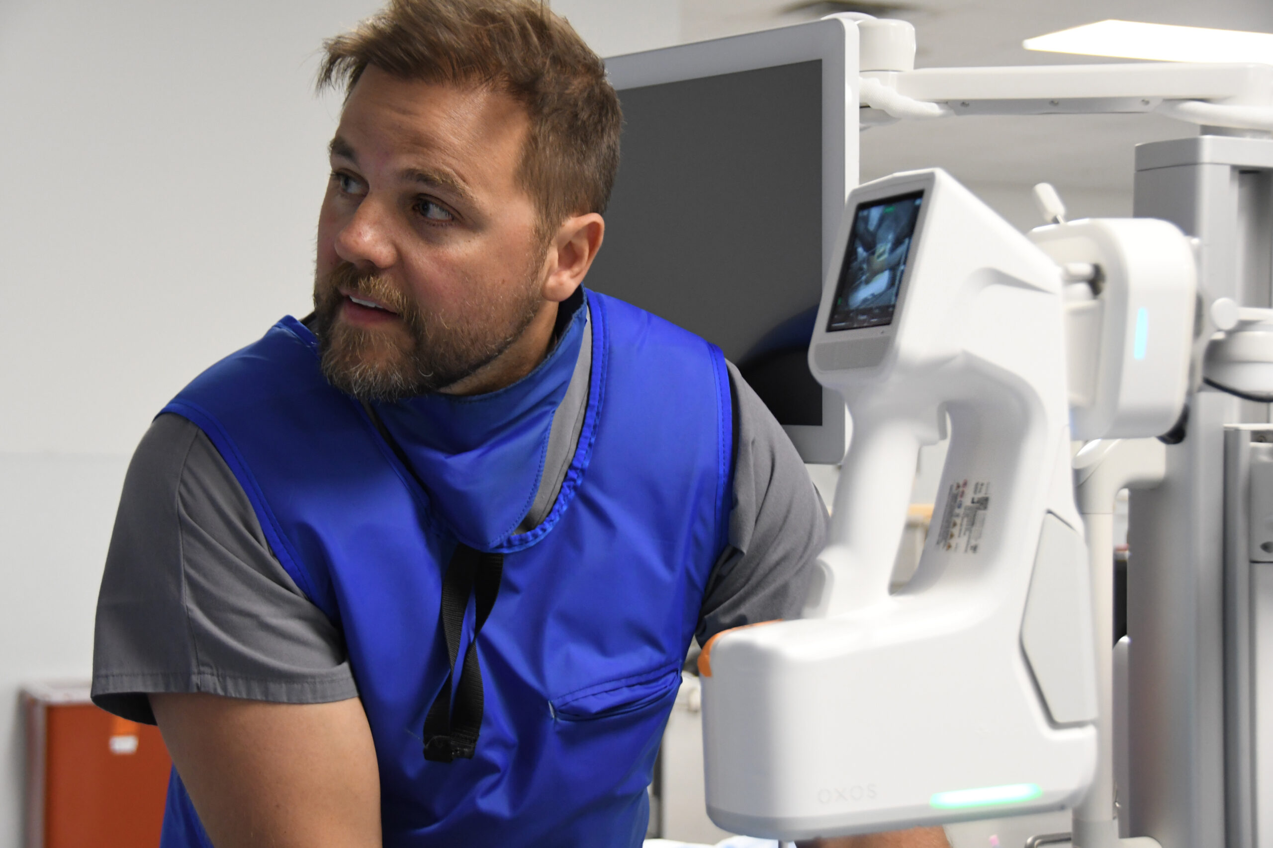 Dr. Gregory Kolovich doing a study with the MC2 portable X-ray.